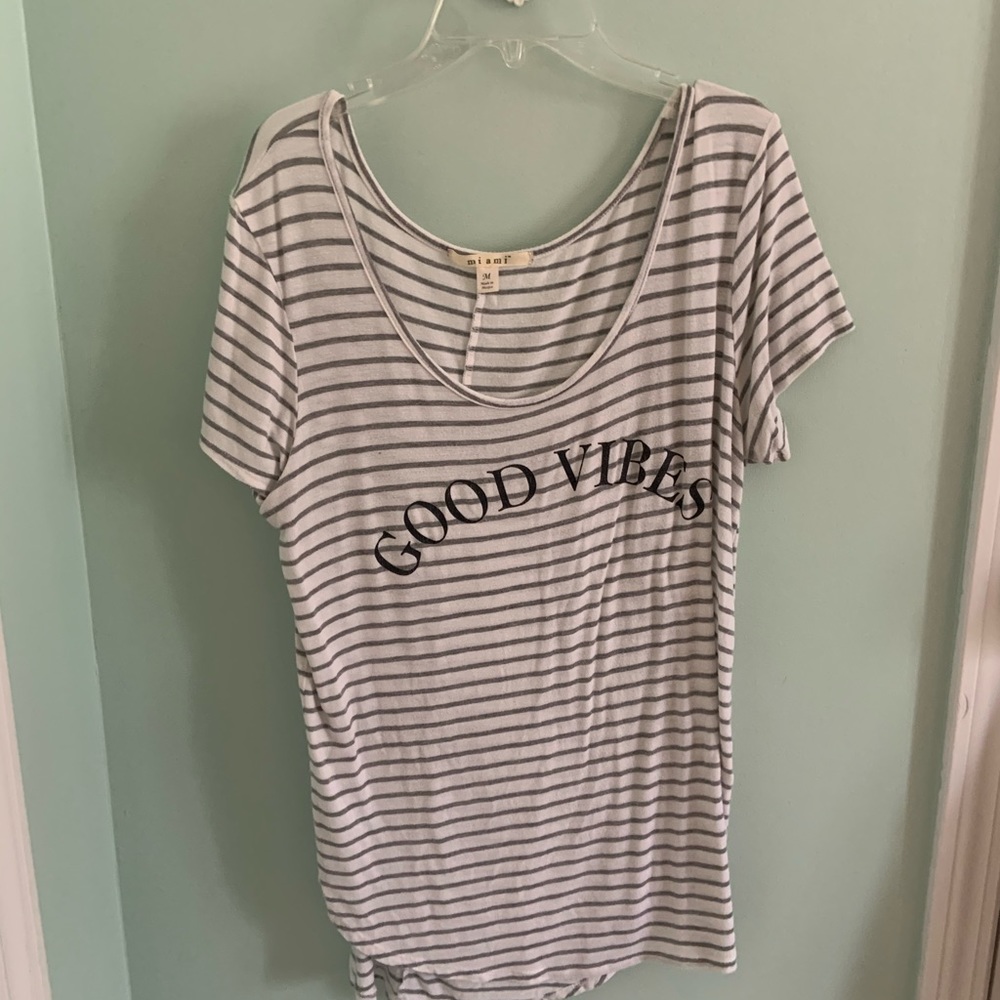white and grey striped shirt